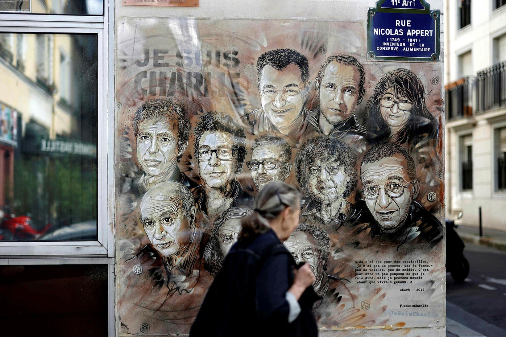 Málverk eftir Christian Guemy í París sýnir starfsmenn Charlie Hebdo …
