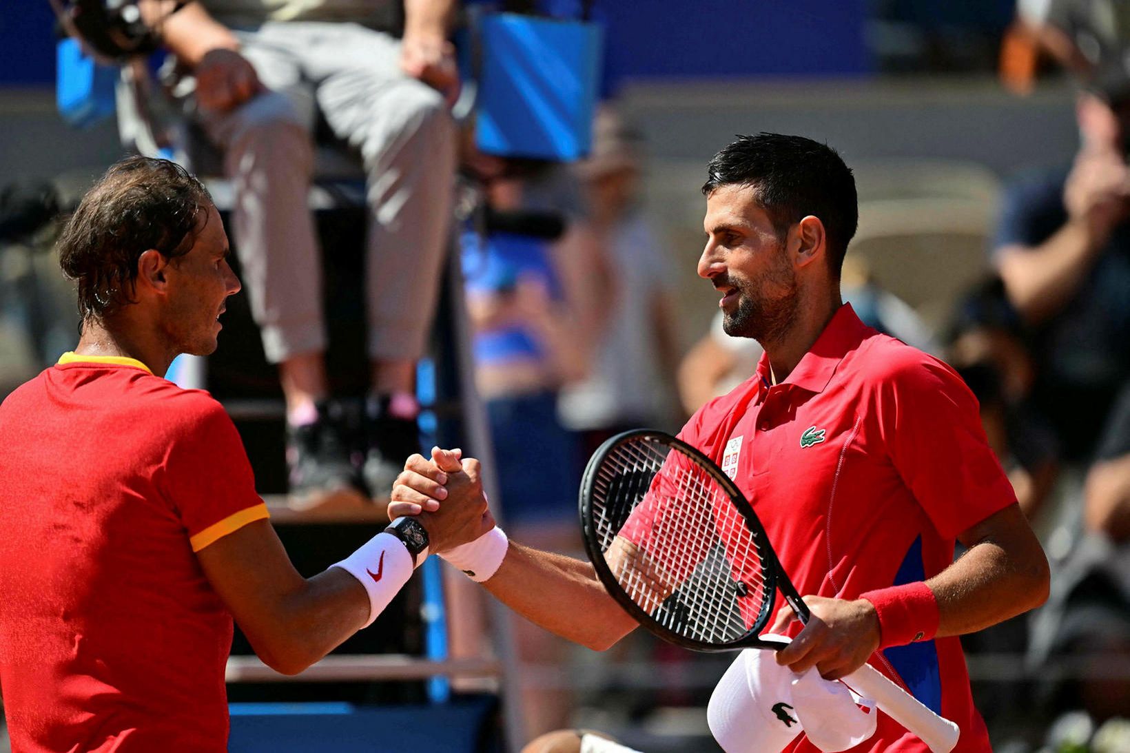 Rafa Nadal og Novak Djokovic takast í hendur í leikslok