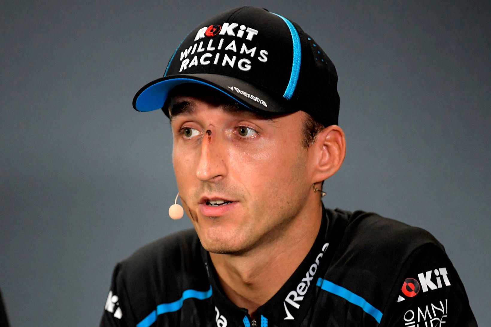 Robert Kubica á blaðamannafundi í Singapúr í dag en þar …