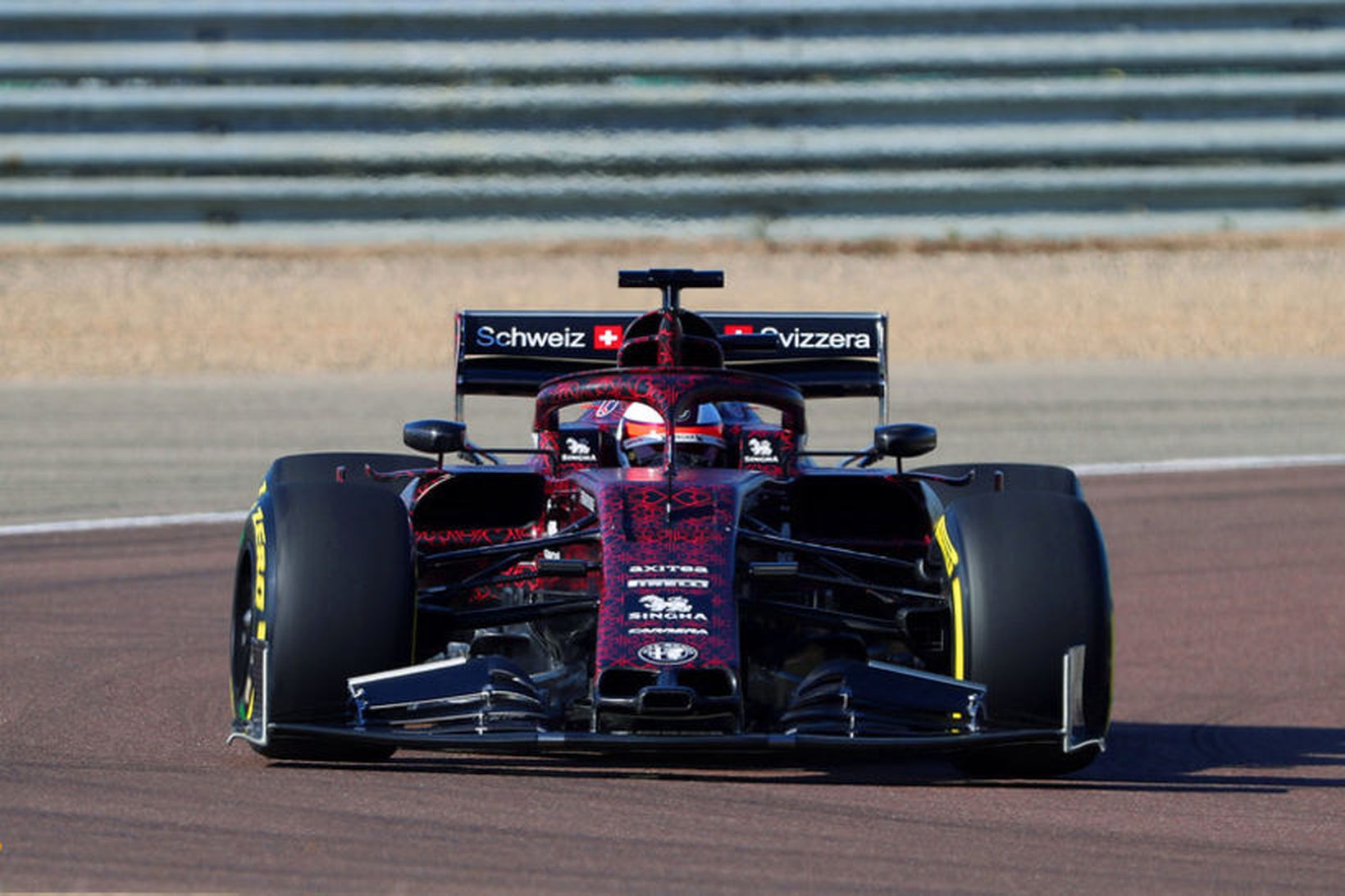 Kimi Räikkönen frumekur Alfa Romeo Sauber í Fiorano í dag. …