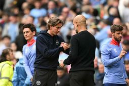 Pep Guardiola og Thomas Frank.