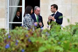 Emmanuel Macron, forseti Frakklands, og Anne Hidalgo, borgarstjóri Parísar, funda með Michael Bloomberg, fyrrverandi borgarstjóra …