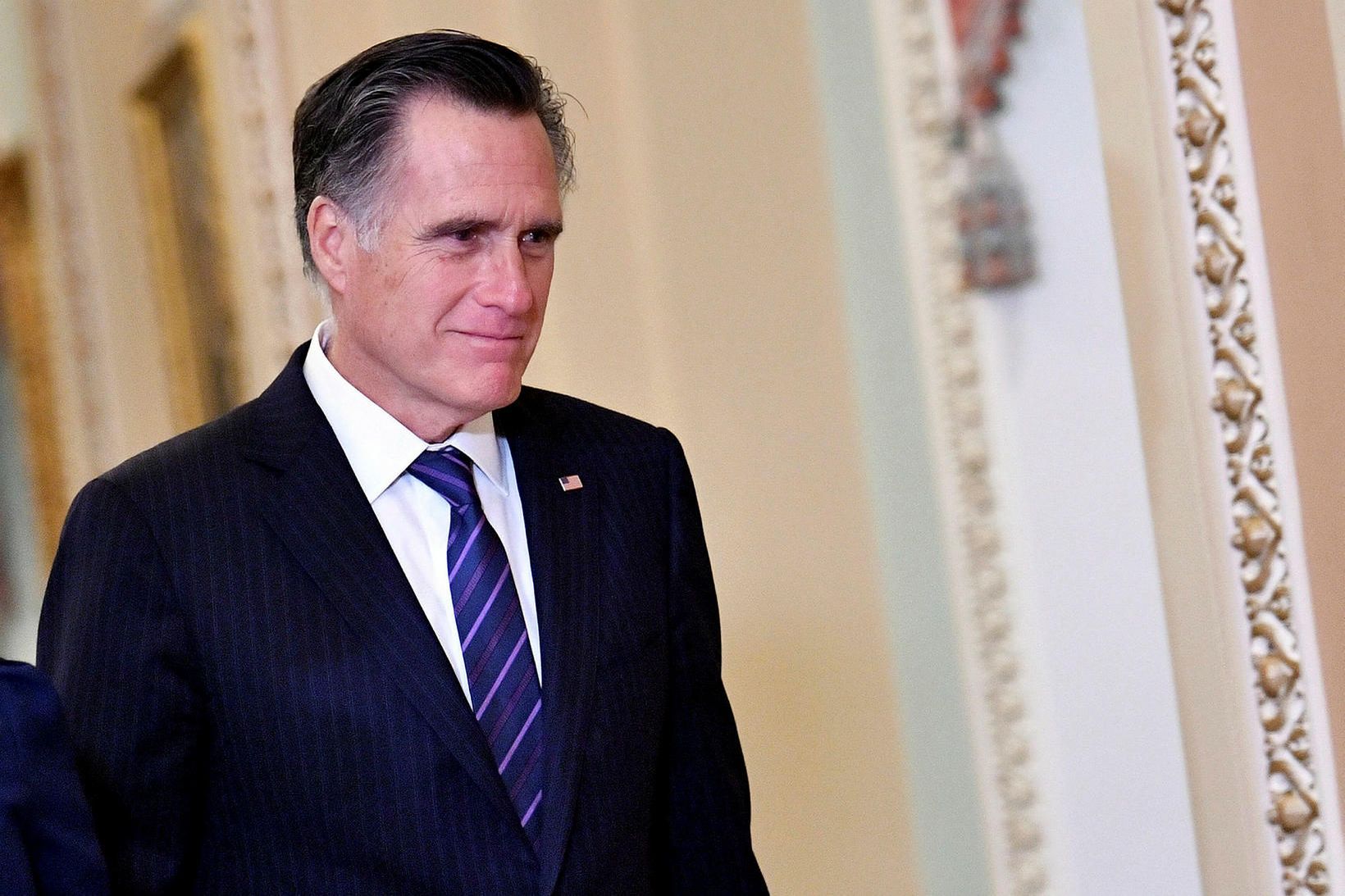 Mitt Romney skráði sig í sögubækurnar með atkvæði sínu í …