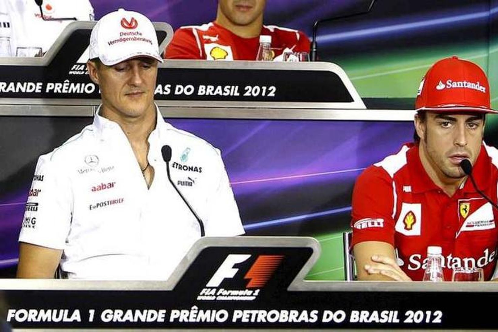Schumacher (t.v.) sem ökumaður Mercedes og Alonso sem ökumaður Ferrari …